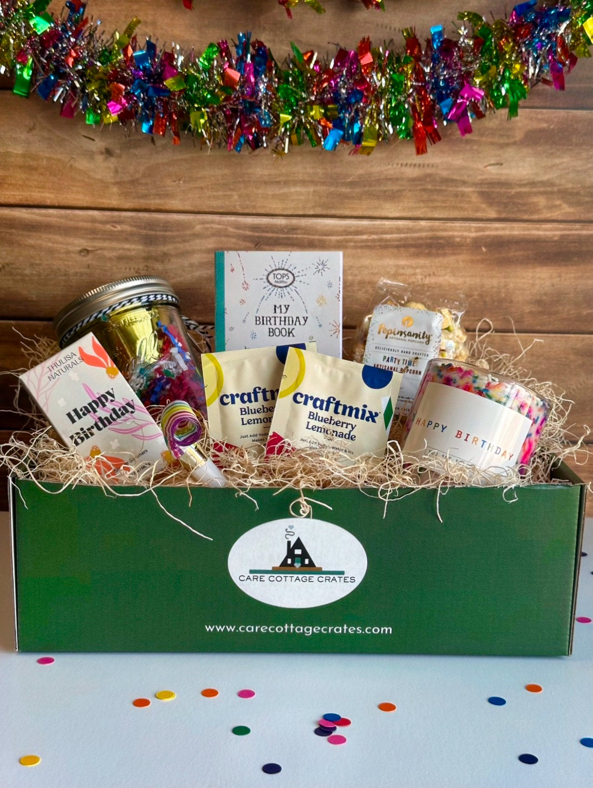 Birthday Gift Crate filled with Party Kit, Birthday Book, Birthday Candle, Birthday Popcorn, Birthday Craftmix, and Birthday Steamers.