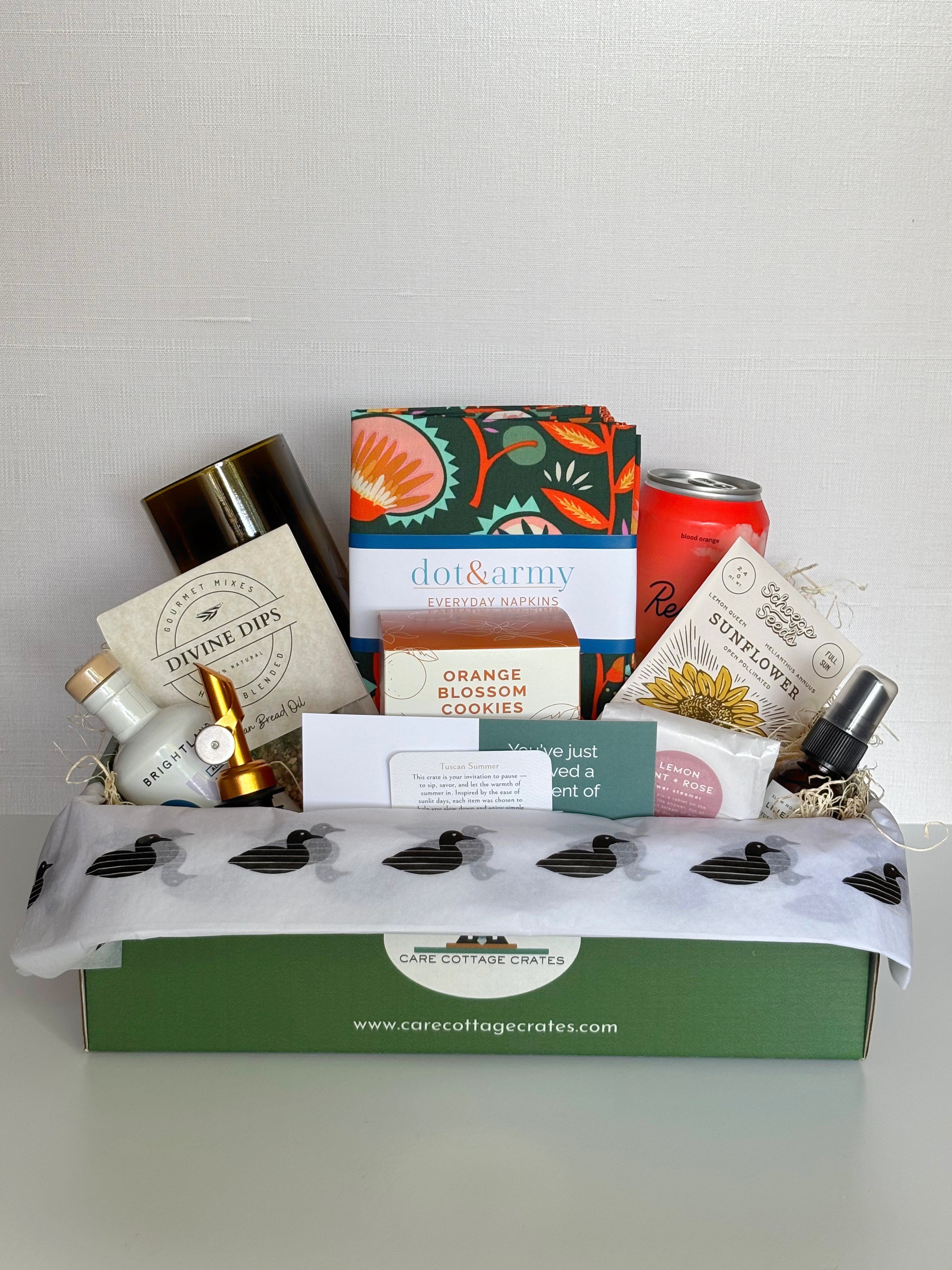 Image of a Gift Basket with olive oil, spout, dip mix, handcut glass, napkins, recess blood orange drink, orange blossom cookies, sunflower seeds, Lemon mint and rose shower steamer, and tuscan summer spray.